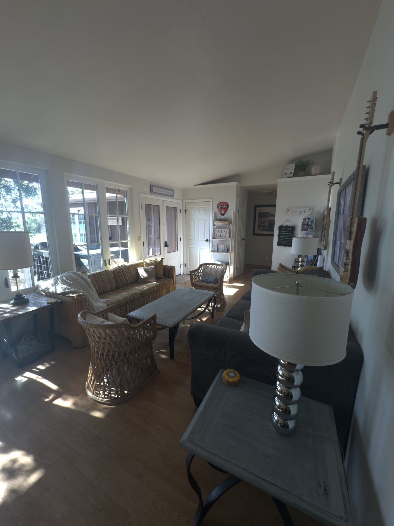 Lake-facing chairs, dining area and work corner